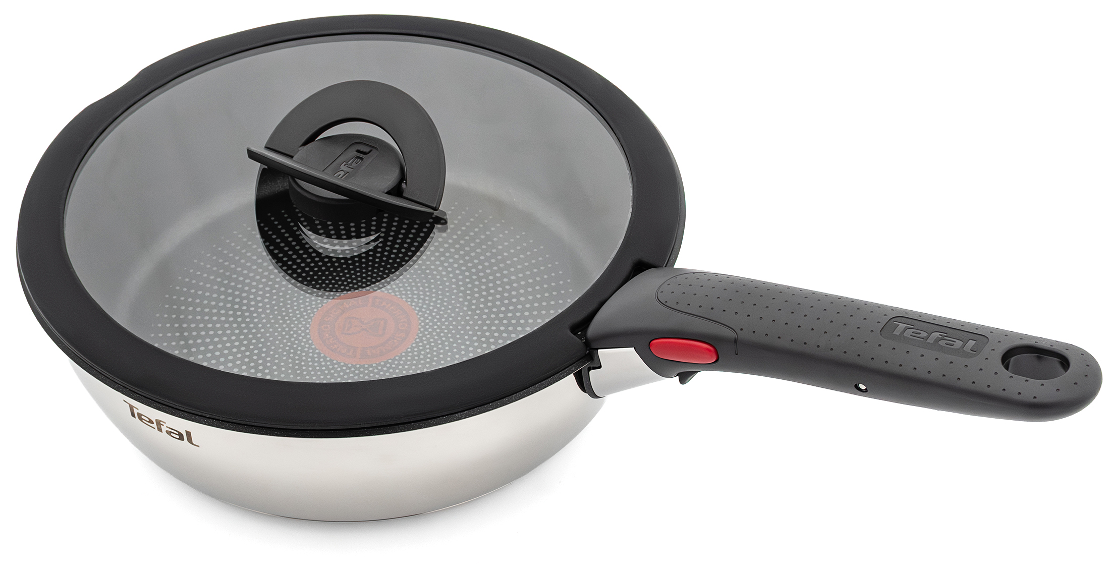 Patelnia Tefal Ingenio Emotion z czarnym dnem, odpinanym uchwytem i szklaną pokrywką.