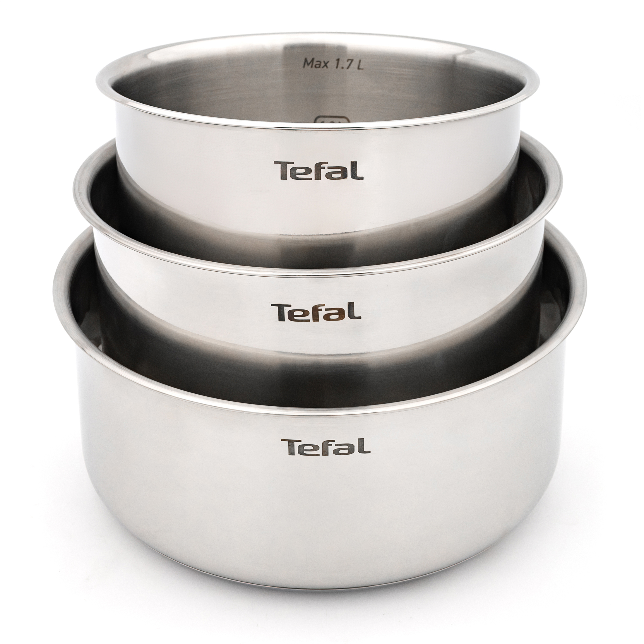 Trzy srebrne garnki Tefal Ingenio Emotion, ułożone jeden w drugim, z widocznym logo Tefal i miarkami pojemności.